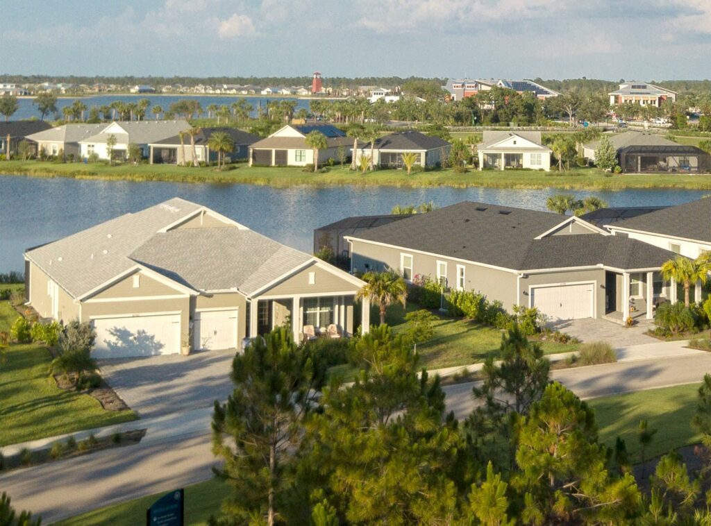 exterior aerial view of homes in a neighborhood