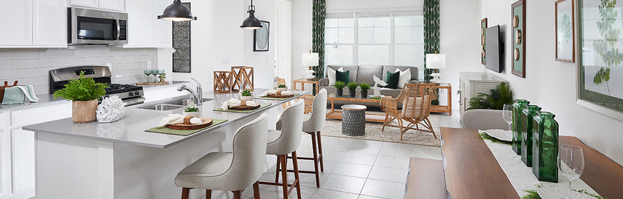 Interior image of kitchen dining and living rooms in Townhome by Park Square Homes